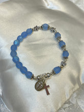 Load image into Gallery viewer, Light Blue Rosary Bracelet with Crucified Jesus Image and Crucifix Charms
