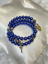 Load image into Gallery viewer, Navy Blue Pearl Rosary Bracelet with Miraculous Medal and Cross Charms

